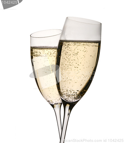 Image of Two champagne glasses in toast