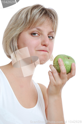 Image of isolated beautiful blond girl with an apple