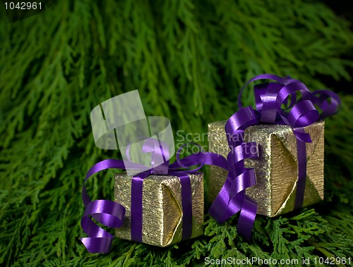 Image of Christmas gifts on green background