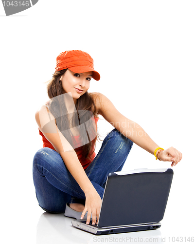 Image of Teenager working with a laptop