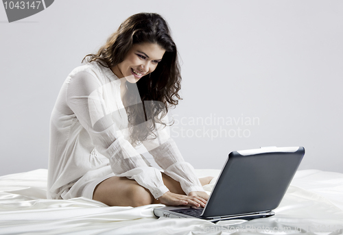 Image of Working on the bed