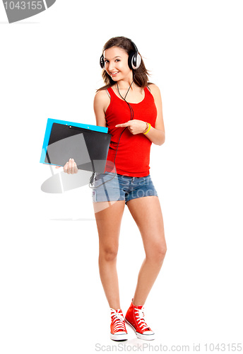 Image of Young girl listen music