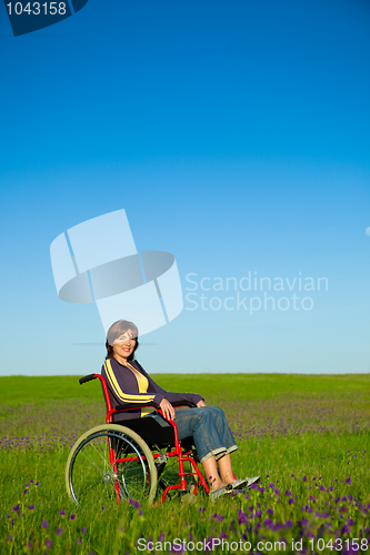 Image of Handicapped woman on wheelchair