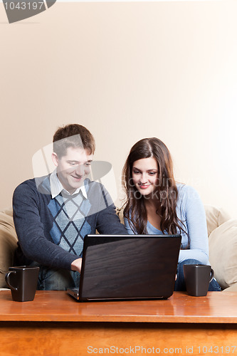 Image of Couple using laptop