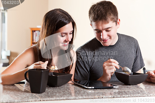 Image of Couple eating breakfast