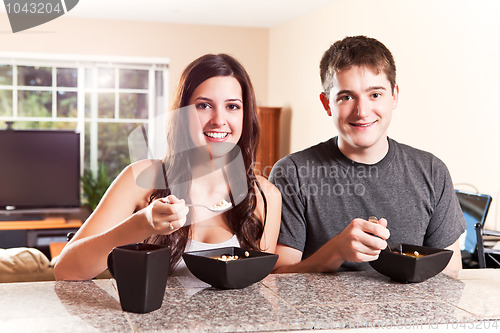 Image of Couple eating breakfast