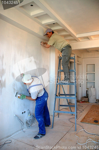 Image of construction workers working