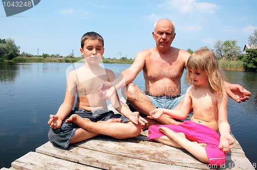 Image of family beach maditation