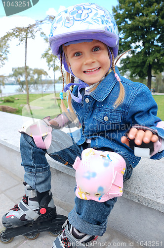 Image of happy little rollerblader