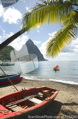 Image of soufriere st. lucia twin piton mountain peaks with fishing boat 