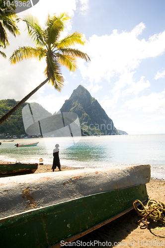 Image of soufriere st. lucia twin piton mountain peaks with fishing boat 