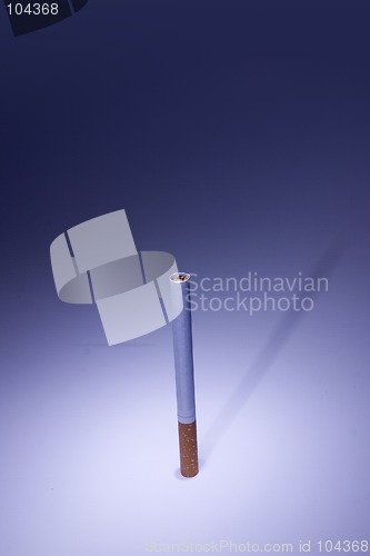 Image of Isolated Cigarette Under Blue Light