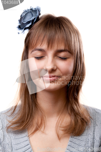 Image of Portrait of the young girl with closed eye