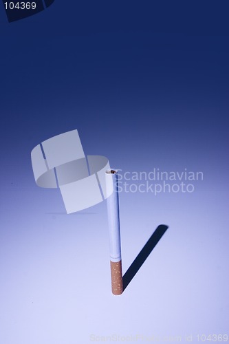 Image of Isolated Cigarette Under Blue Light