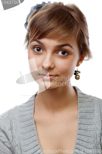 Image of Portrait of the young girl in flower in hair