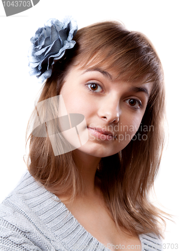 Image of Portrait of the young girl in flower in hair