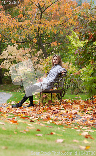 Image of Girl on small bench