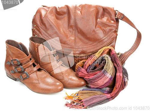 Image of Brown leather bag, scarf and pair feminine boots