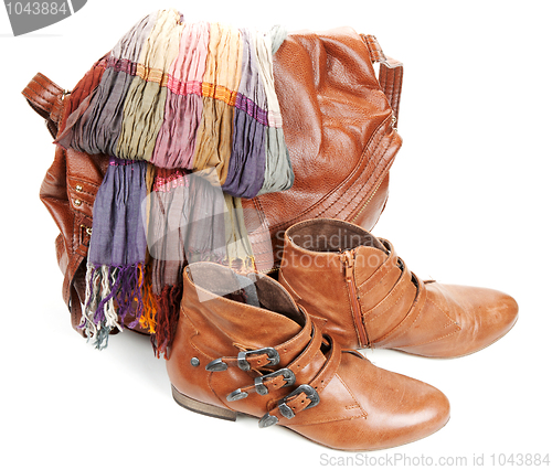 Image of Brown leather bag, scarf and pair feminine boots