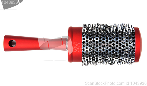 Image of One red massages comb