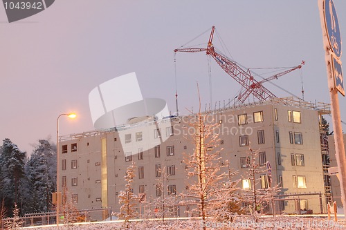 Image of Construction of the house with the crane