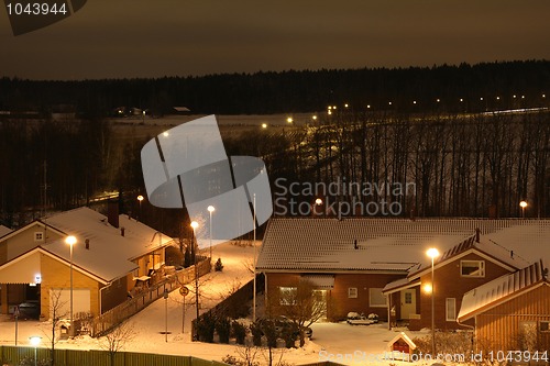 Image of The house in a snow at night