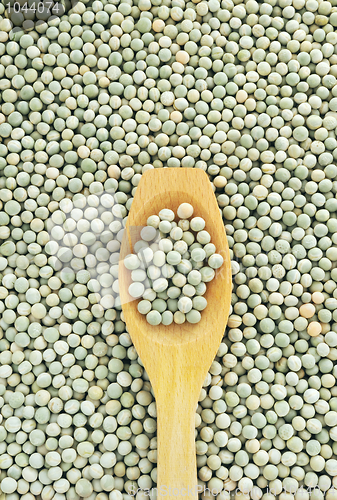 Image of Wooden spoon and dried green split peas