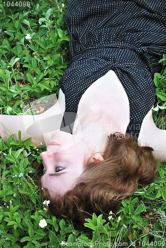 Image of young woman on lawn