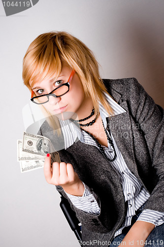 Image of businesswoman with money