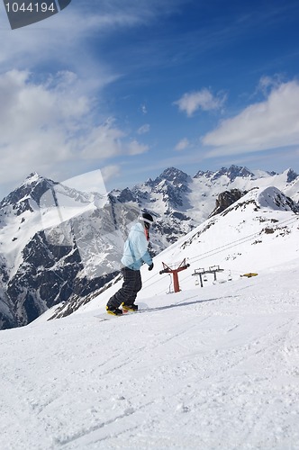 Image of Snowboarder on ski slope