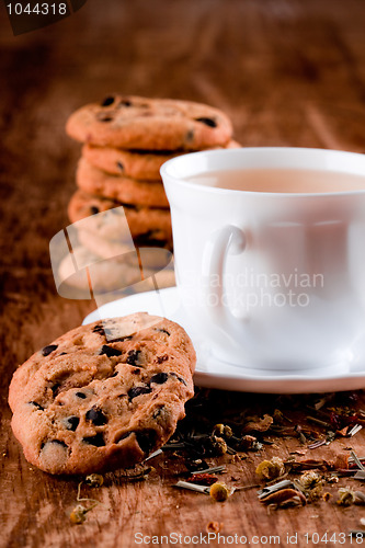 Image of cup of herbal tea and some fresh cookies