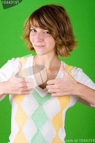 Image of woman showing trumb gesture