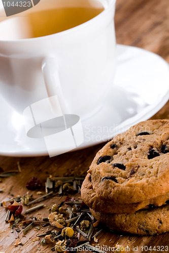 Image of cup of herbal tea and some fresh cookies