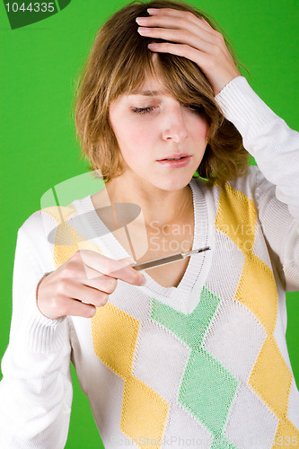 Image of attractive woman with headache