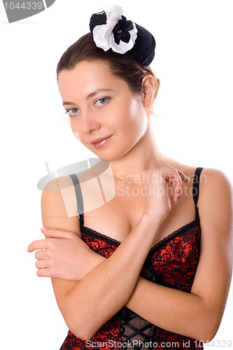 Image of woman in corset and little hat