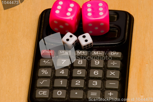 Image of dice and a calculator