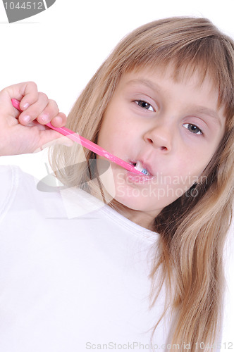 Image of child brushing teeth