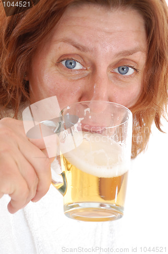 Image of woman drinking beer