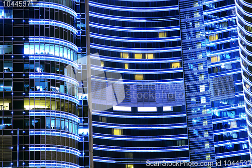 Image of Late night overtime in a modern office building. 