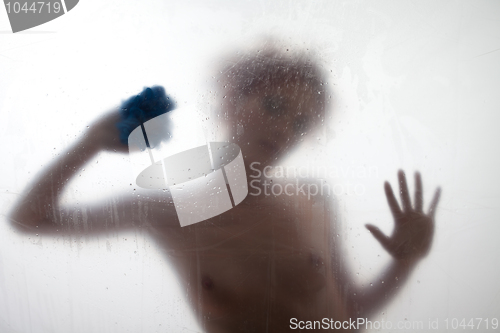 Image of Sexy woman taking a shower s