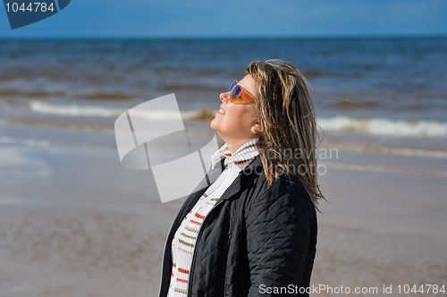 Image of Portrait of woman at the sea