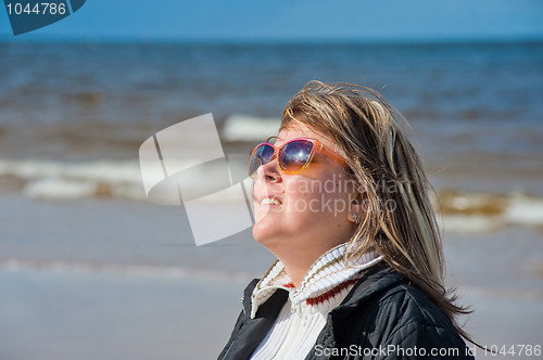 Image of Portrait of woman at the sea