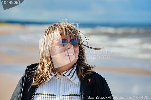 Image of Portrait of woman at the sea