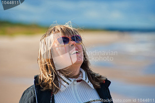 Image of Portrait of woman at the sea