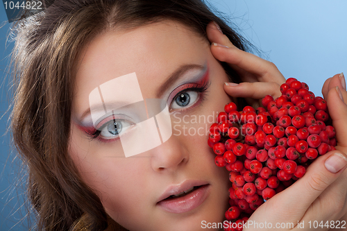 Image of Woman with rowan berry