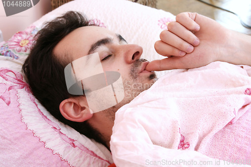 Image of Young man sleeping .