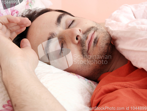 Image of Portrait of a young man sleeping.