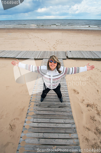 Image of Adult woman at the sea