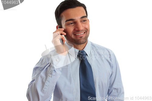 Image of Businessman talking on phone