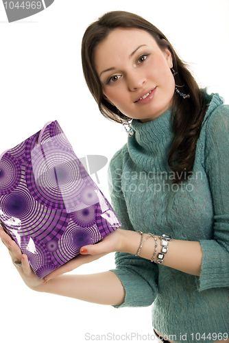 Image of Young girl with shopping bag